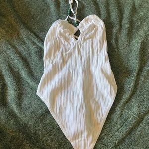 white body suit with beads